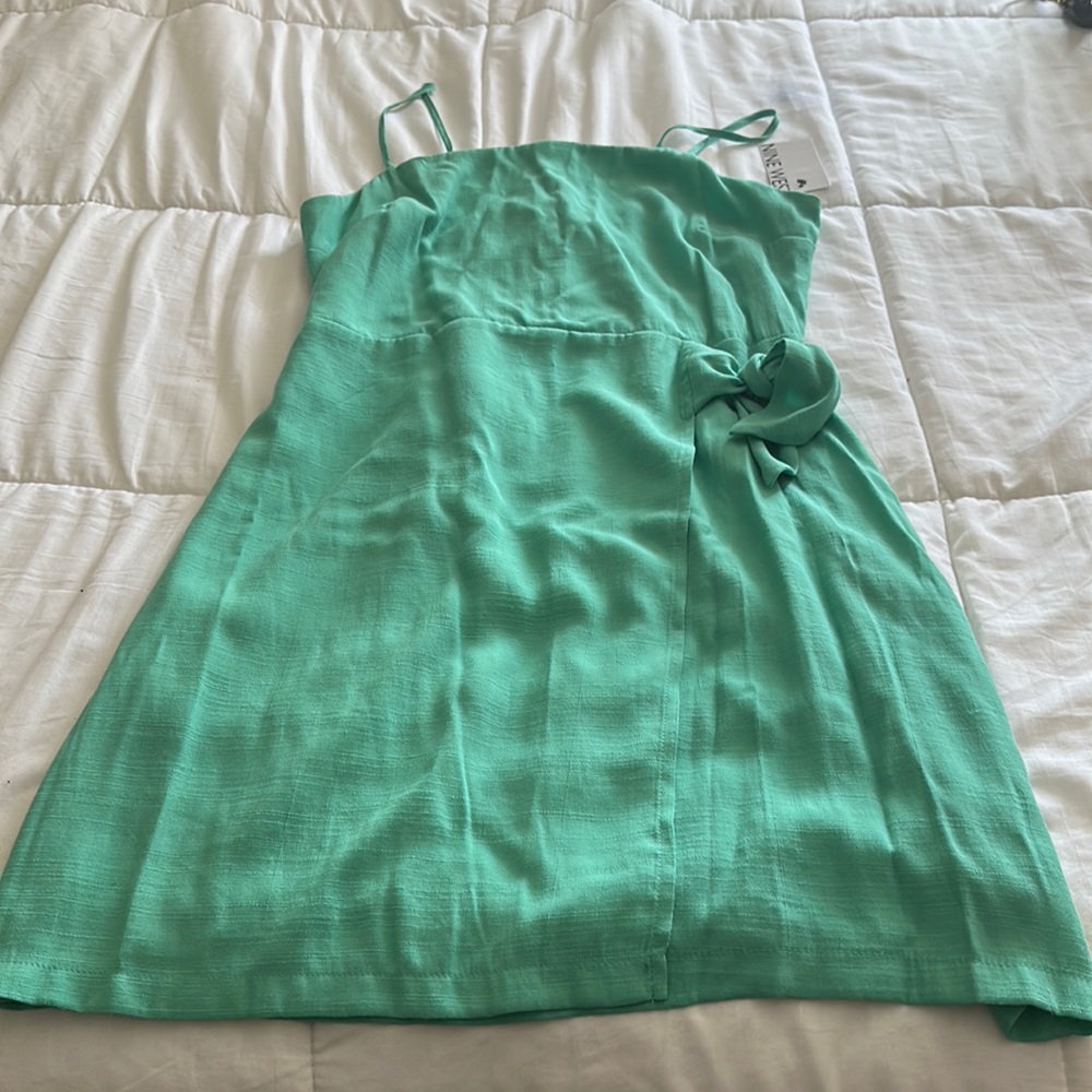 Medium size teal Nine West dress